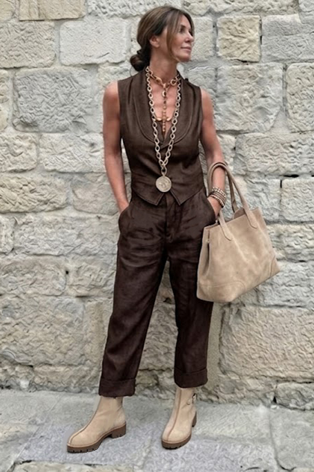 Dress ankle boots back buckles in tan beige leather with thick rubber soles and round toe - Worn view